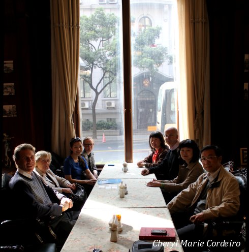 Breakfast group at La Vie En Rose, Astor House Hotel, Shanghai along the Bund.