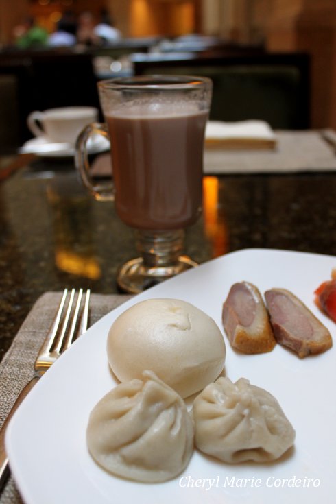 Chinese hong dao bao and xiao long bao, hot chocolate.