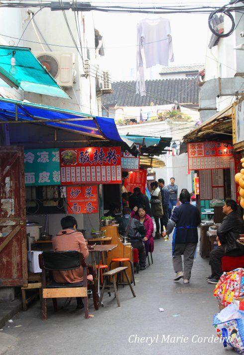Street food stalls, inner lane, Yuyuan, Shanghai 2011.